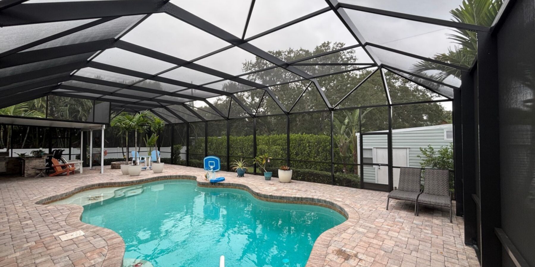 Dome style aluminum screened pool enclosure